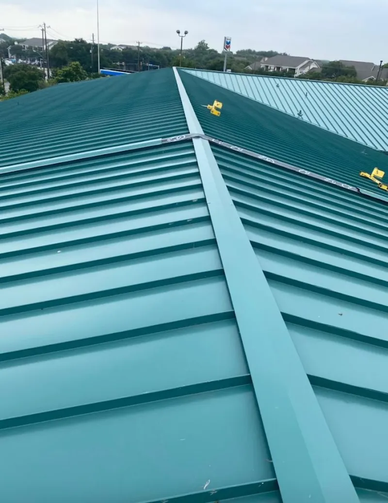 Green commercial metal roof ridge and valley for Metal Roof Repair in Williamsport